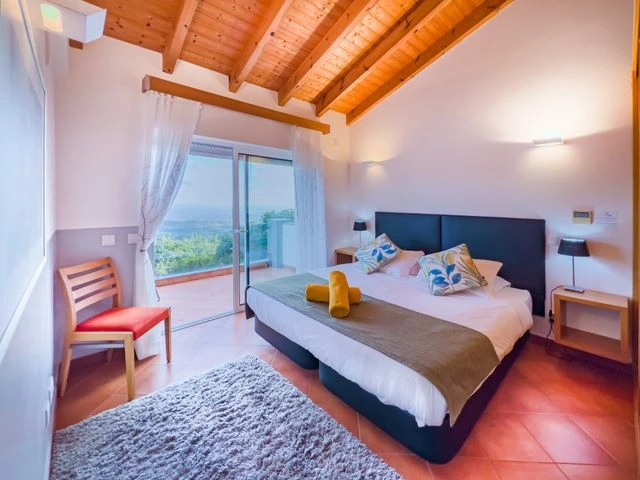 Double room with a private balcony and mountain view